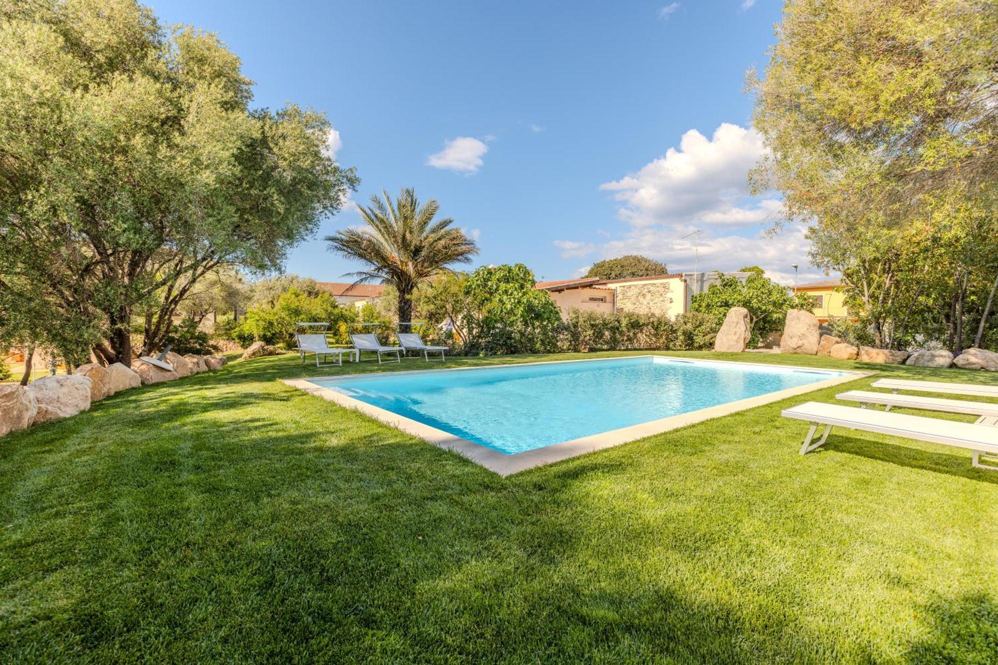 Appartement Stazzo San Teodoro Piscina Condivisa Extérieur photo