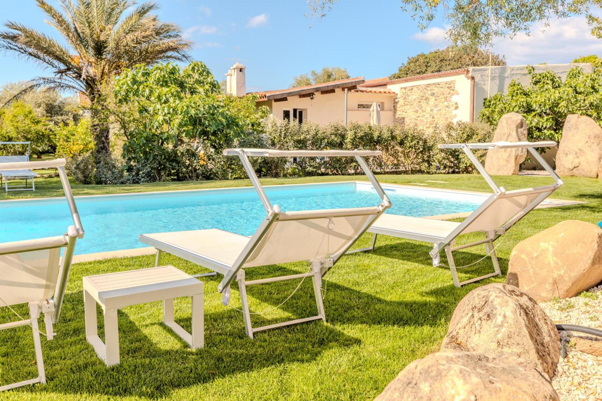 Appartement Stazzo San Teodoro Piscina Condivisa Extérieur photo