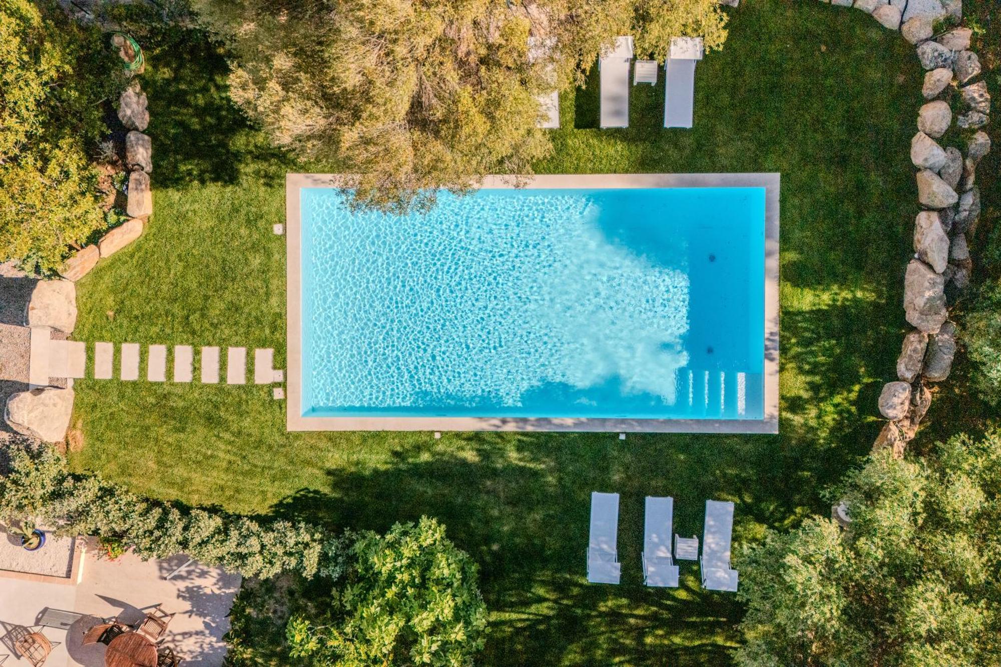 Appartement Stazzo San Teodoro Piscina Condivisa Extérieur photo